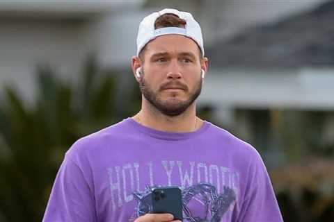 Colton Underwood takes a stroll around the new neighborhood after buying a house with boyfriend..