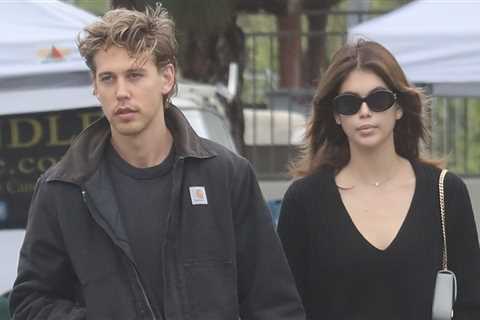 Kaia Gerber & Austin Butler hold hands during a trip to the farmers market