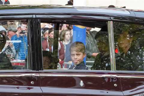 Cheeky Prince George spotted poking out his tongue as he sits next to Charlotte after Queen’s..