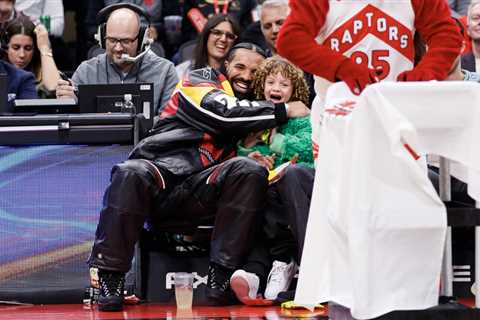 Drake & Son Adonis Get a Sweet Surprise From Toronto Raptors Mascot While Sitting Courtside