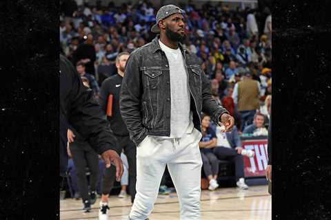 LeBron James Wears Huge Walking Boot To Lakers Game, Season In Jeopardy