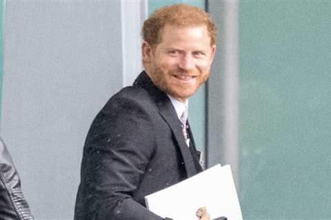 Prince Harry grins at Heathrow before jetting to LA just an hour after coronation as his family..