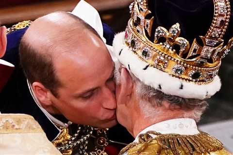 Prince William seals dad King Charles’ coronation with a kiss as he vows loyalty to his father