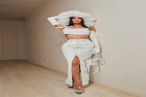 Kim Kardashian flaunts her ultra tiny waist in white crop top and denim skirt for new photos after..