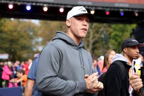 Aaron Judge hugs wife Samantha Bracksieck after she finishes NYC marathon