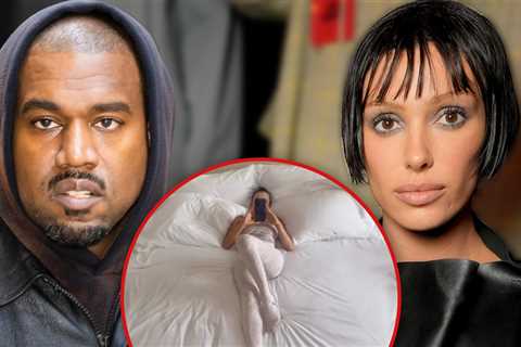 Kanye West Films Bianca Censori Laid Out in Giant Bed with Sexy Outfit