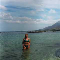 Josie Gibson rocks a green bikini as she takes a dip in the Irish Sea
