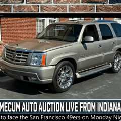 Pat McAfee wins Mecum Cadillac auction for show staffer live on-air