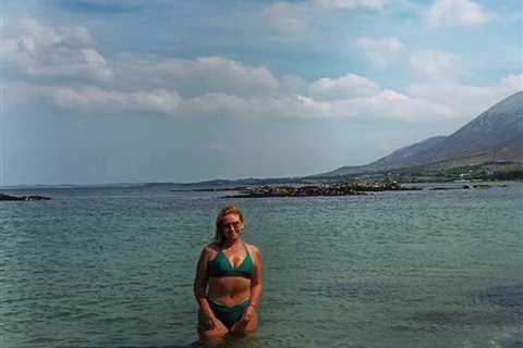 Josie Gibson rocks a green bikini as she takes a dip in the Irish Sea