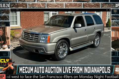 Pat McAfee wins Mecum Cadillac auction for show staffer live on-air