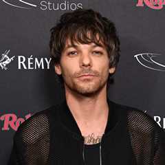 Louis Tomlinson Greeted as Hero After Setting Up TV at Glastonbury Festival to Screen England’s..