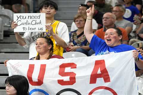 Japan basketball fan taunts Team USA with Caitlin Clark sign