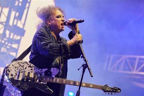 The Cure’s Robert Smith Says Writing About Brother’s Death on ‘I Can Never Say Goodbye’ Helped Him..