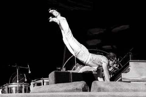 Sir Elton John’s 50-Year Career Honored With Gravity-Defying Keyboard Handstand Figure at Madame..