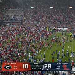 Ole Miss fans storm field with time remaining on clock, prompting delay to game’s end