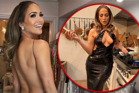 Jennifer Lopez Struts her Stuff in Tight-Fitting Gown on Video