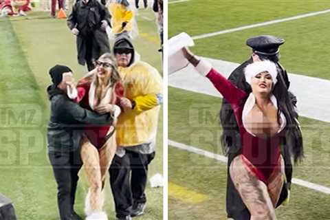 Models Attempt To 'Streak' in Risqué Santa-Themed Outfits At 49ers Game