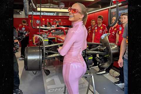 Jennifer Lopez Stuns in Sexy Pink Catsuit at  F1 Grand Prix