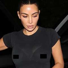 Kim Kardashian Reveals Possibly Pierced Nipples in Tight Black T-Shirt
