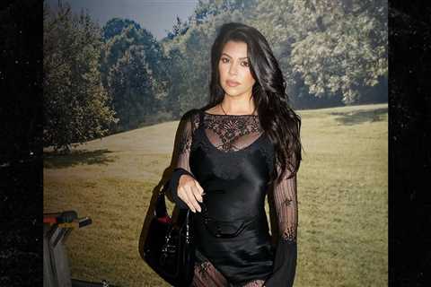 Kourtney Kardashian Bares Skin in Tight, Lacy Minidress
