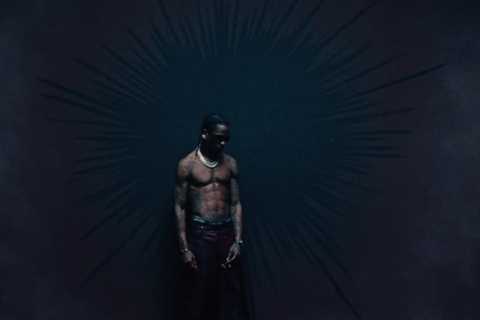 Travis Scott Gets Inked With a Tiger Tattoo in Eerie ‘DUMBO’ Video: Watch