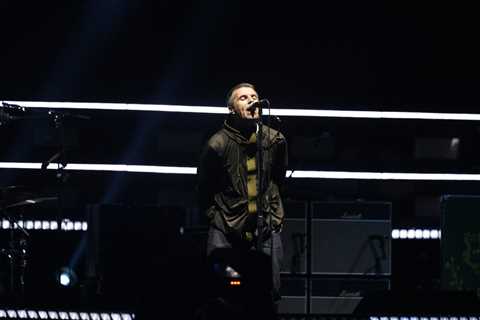 Liam Gallagher Pokes Fun at ‘Snidey’ Coldplay Kiss Cam Scandal During Manchester Show