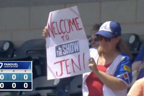 Fans give Jen Pawol plenty of support as she makes MLB history as first female umpire
