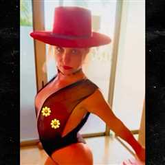 Britney Spears Smacks Butt, Dances in Sheer Bodysuit