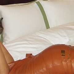 Guess The Sexy Star Laid Up In Leather!
