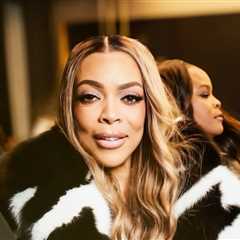 Wendy Williams Spotted at LaQuan Smith NYFW Show win a Black and White Fur Coat with Black Mini..