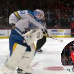 Blues goalie Jordan Binnington tries to steal puck from Alex Ovechkin’s historic 900th goal