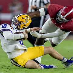 Garrett Nussmeier gets his head twisted on facemask in frightening play