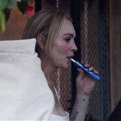 Lindsay Lohan Vapes, Eats Ice Cream in Miami With Husband, Son