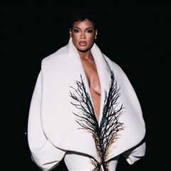 Didi Stone Wears Ivory Sculptural Stephane Rolland Haute Couture Gown to Time France Event