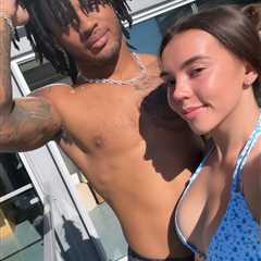 Omarion Hampton hits beach with bikini-clad girlfriend days after crushing Chargers playoff exit