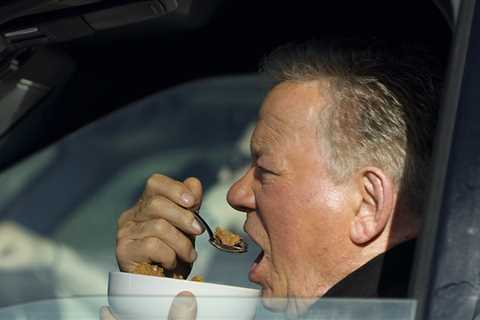 William Shatner Photographed Eating Bowl of Cereal in His Car at Stop Light