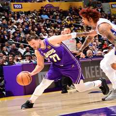 Luka Doncic exits Lakers vs. 76ers with left leg injury