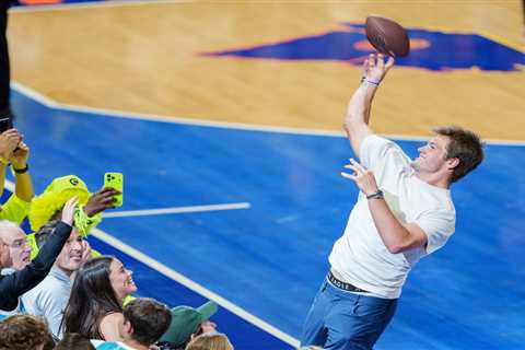 Drake Maye hurls footballs into crowd during NBA date night with wife