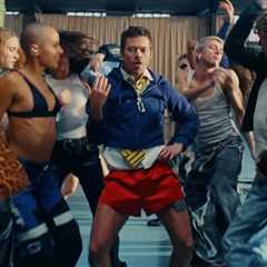 Harry Styles Demonstrates the Power of Dancing & His Little Red Shorts in Playful ‘Dance No More’..