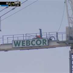Exercising construction worker steals show during college baseball game broadcast