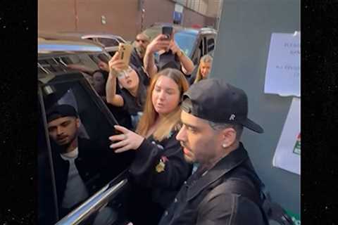 Zayn Malik Snaps At Fans As They Block Him Getting Into Car In UK On Video