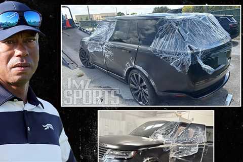 Tiger Woods' Wrecked Range Rover From DUI Crash in Junkyard, Photos Show