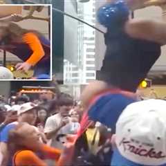 Wild video shows cat fight over Knicks parade viewing spot as woman loses pants — then twerks in..