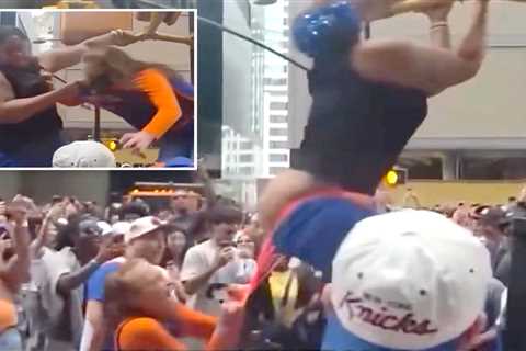 Wild video shows cat fight over Knicks parade viewing spot as woman loses pants — then twerks in..