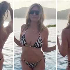 Cheek of the Week -- Heidi Klum Sizzles In Zebra Thong Bikini