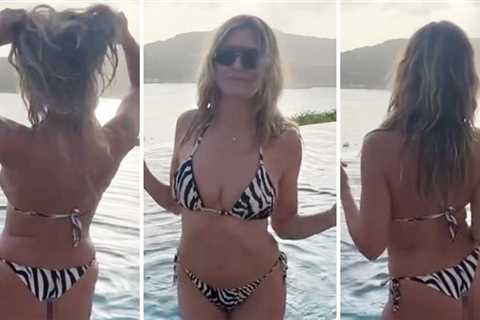 Cheek of the Week -- Heidi Klum Sizzles In Zebra Thong Bikini